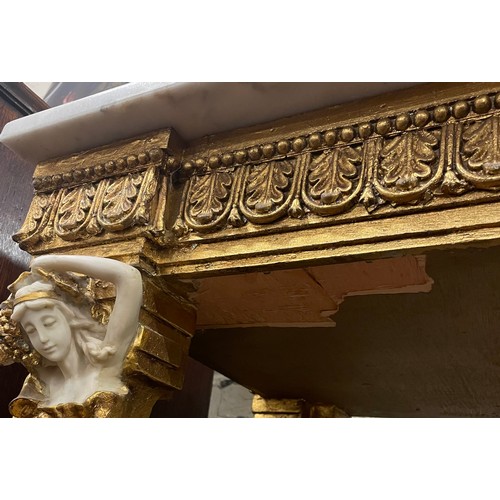 454 - A Rococo style gilt wood console table and matching mirror, with white marble top and figural decora... 