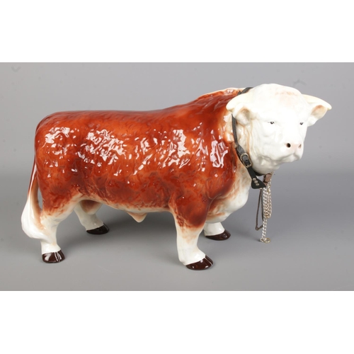 111 - A large Melba Ware ceramic figure of a Herefordshire Bull. Approx. height 25cm.