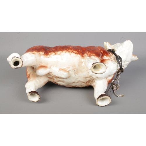 111 - A large Melba Ware ceramic figure of a Herefordshire Bull. Approx. height 25cm.