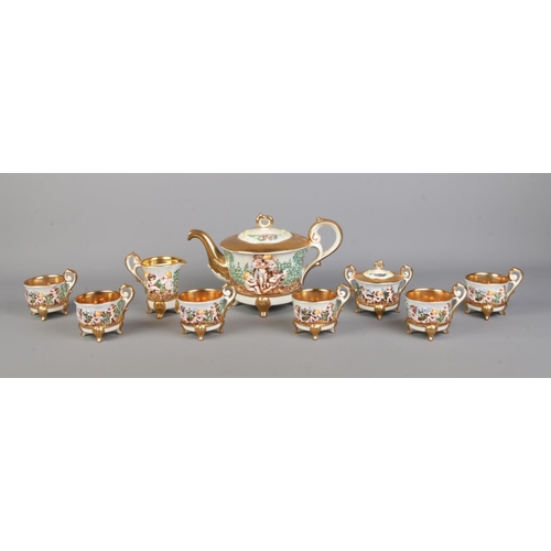 13 - A GV Capodimonte tea service, including teapot, six cups and milk jug. Featuring gilt edging and che... 