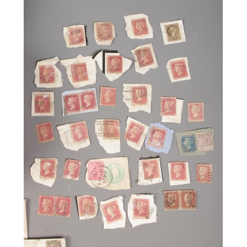 14 - A good collection of assorted loose world stamps to include 30 Victorian Penny Reds, East India Post... 