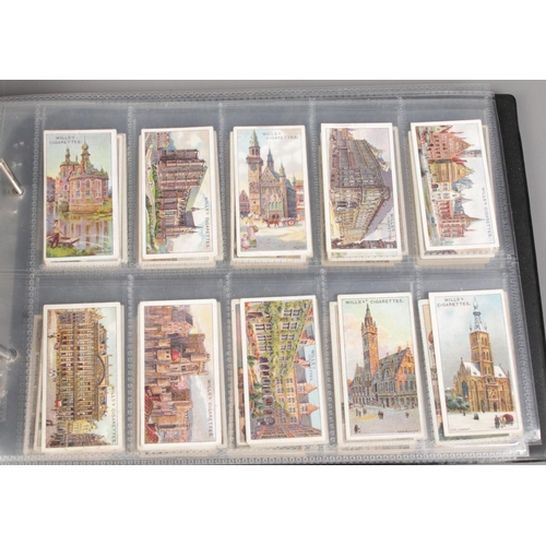 163 - Three albums featuring themed sets of vintage cigarette cards, along with a collection of Sheffield ... 