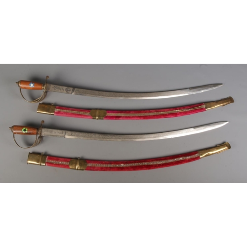 23 - Two vintage Indian cavalry dress swords both in velvet wrapped scabbards with etched blade and flora... 