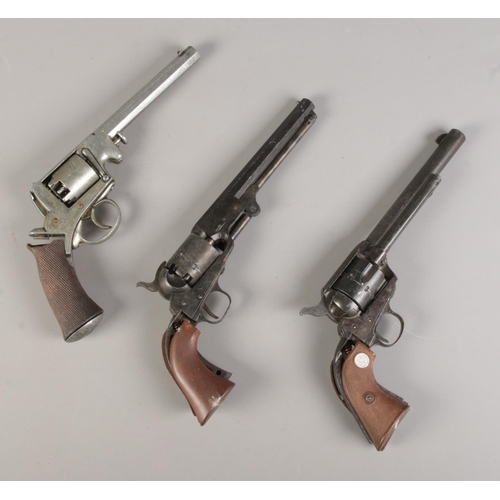 184 - Three replica metal Revolvers, broken grips, for spares and repair, length 31cm/31cm/32cm respective... 