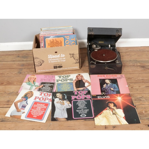 220 - A Columbia Viva-Tonal Grafonola portable record player No. 2214 along with a small quantity of LP Re... 