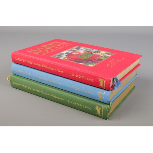 3 - JK Rowling, three hard back Harry Potter deluxe edition books. Includes the Philosopher's Stone, the... 