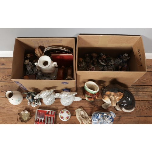 238 - Two boxes of assorted items, to contain figural ceramics including Capodimonte style examples, Leona... 