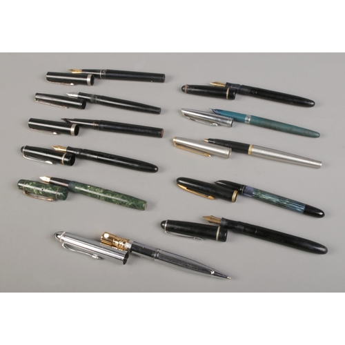 43 - A mixed collection of vintage fountain pens, including Osmiroid 65, Nova emerald green, Parker 45 an... 