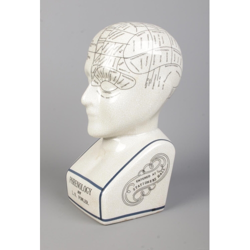 51 - A L.N. Fowler ceramic phrenology head. Height: 29cm.