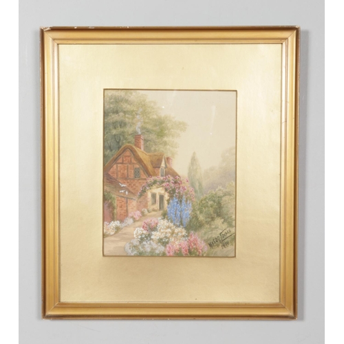 320 - Mason Cooke (Twentieth Century); A watercolour of a countryside cottage surrounded by flowers. Signe... 