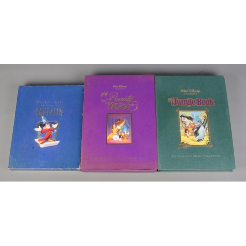 60 - Two Walt Disney's Classics The Collector's Deluxe Video Edition sets along with a Walt Disney's Mast... 