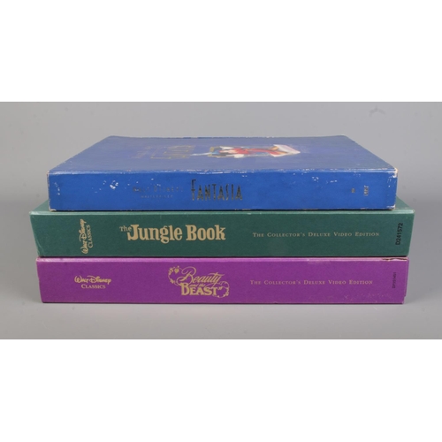 60 - Two Walt Disney's Classics The Collector's Deluxe Video Edition sets along with a Walt Disney's Mast... 