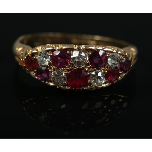 361 - An 18ct gold ruby and diamond ring. Size N. 3.29g.