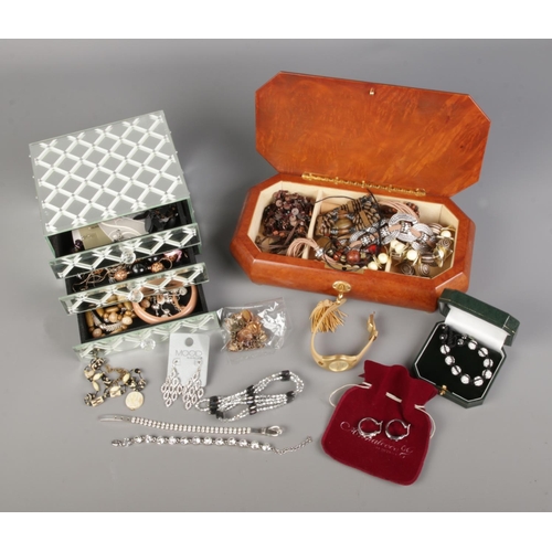 62 - Two jewellery boxes with contents of assorted costume jewellery to include beaded necklaces, bone ne... 