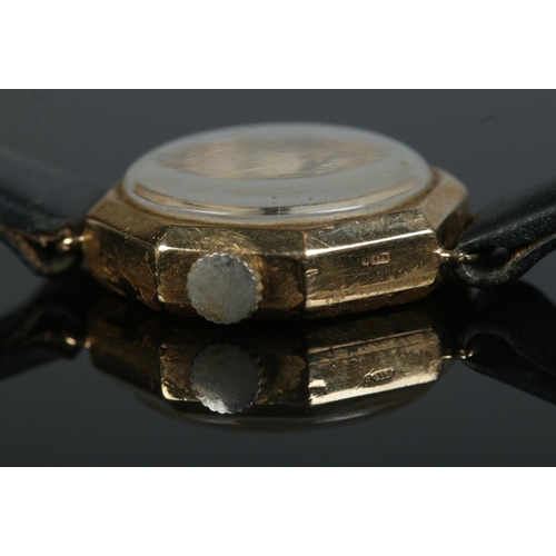 393 - A 9ct gold cased Derrick manual ladies wristwatch on leather strap featuring subsidiary seconds dial... 