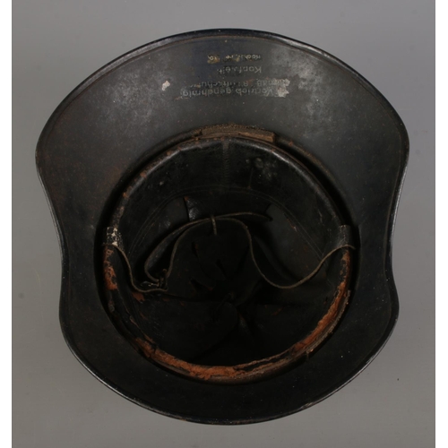 407 - WW2 German Luftschutz gladiator pattern steel helmet, interior with the original leather liner syste... 