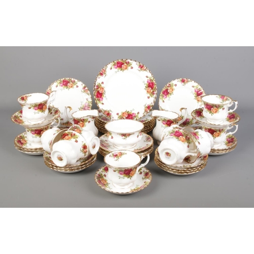 73 - A quantity of Royal Albert Old Country Roses dinnerwares, to include plates, side plates, cups and s... 