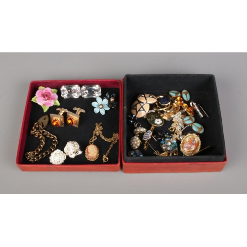 77 - A leather box filled with vintage earrings, cufflinks and brooches, including a Dorothy Ann fine Chi... 