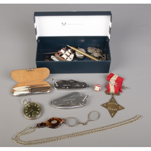 78 - A box of vintage collectables, including British Army pocket knife, sovereign case, military pocket ... 