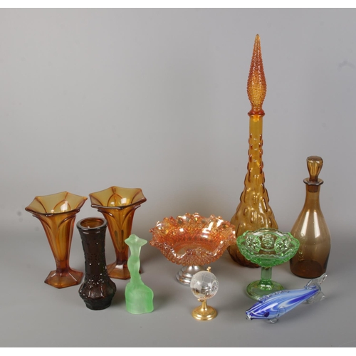 79 - A collection of coloured glassware to include Bagley & Co uranium 'Andromeda' statuette, Empoli ambe... 