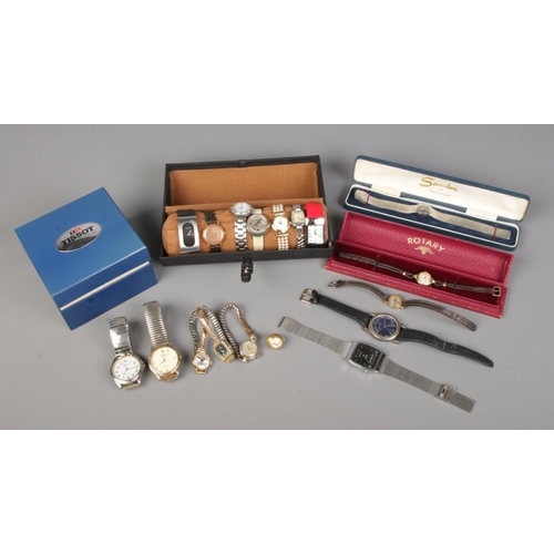 83 - A box of mixed vintage and modern wristwatches, including Rotary, Sandoz, Gucci and a Tissot watch e... 