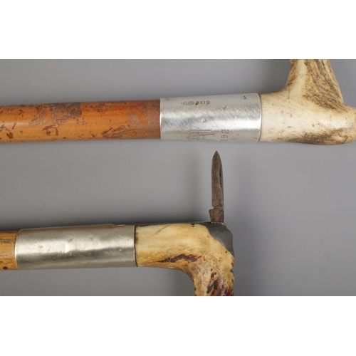 93 - Two horn handled riding crops to include James Smiths & Sons silver collared example, hallmarked for... 