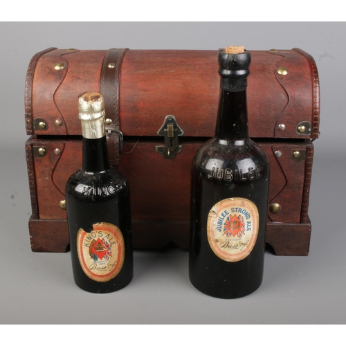 96 - Two bottles of Bass ale to include Jubilee Strong 1977 and Kings Ale 1902 in decorative leather trun... 