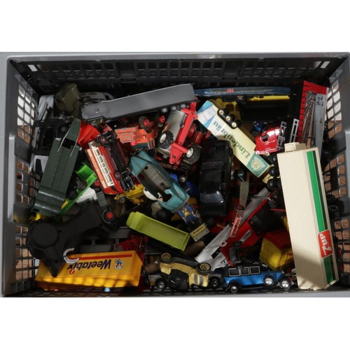 258 - A large quantity of vintage die cast vehicles and other toys, including examples by Matchbox, Corgi,... 