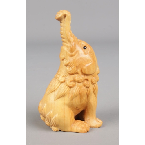 446 - A hand carved hardwood netsuke formed as a elephant