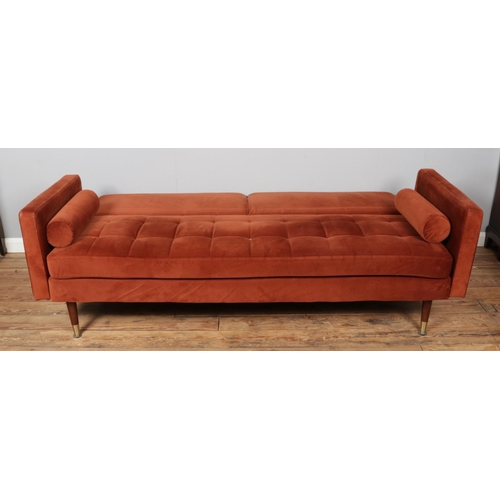 472 - A cinnamon velvet retro style three seater sofa.

Hx83cm
Wx200cm
Dx70cm