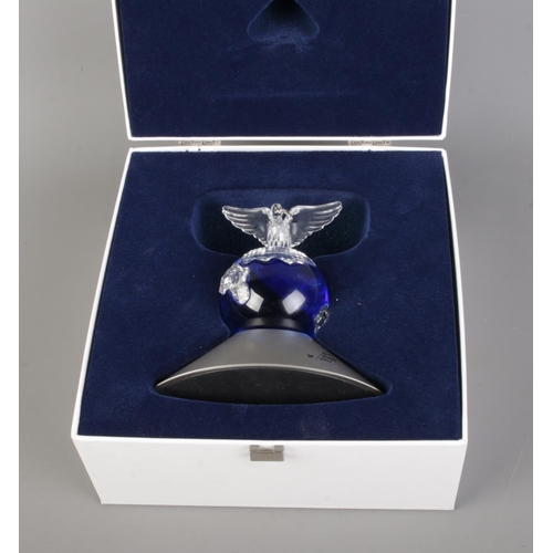 10 - A boxed millennium edition Swarovski Crystal Planet Vision 2000 figurine, designed and signed by Ant... 