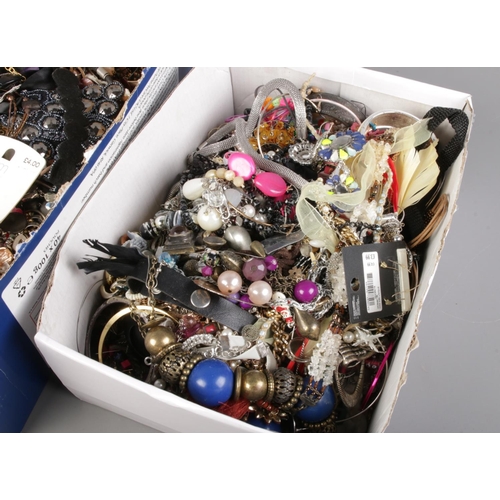 25 - Two boxes of costume jewellery, containing necklaces, brooches and bracelets etc, some with tag.