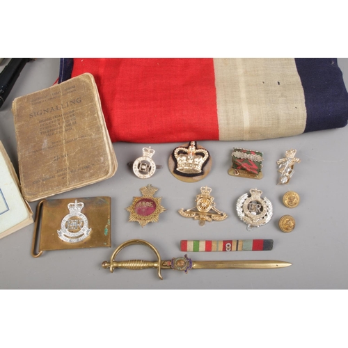 41 - Military collections including a copper & brass military signal Bugle with cords and coat of arms of... 