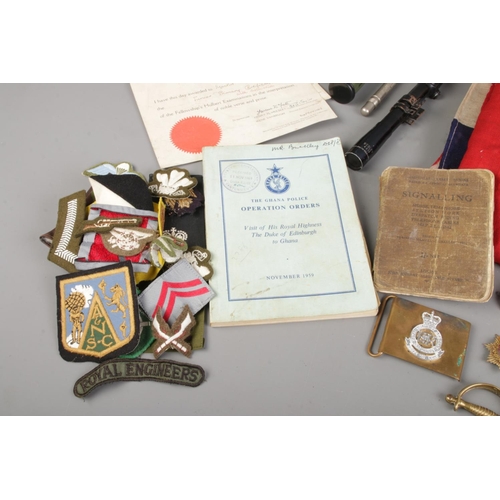 41 - Military collections including a copper & brass military signal Bugle with cords and coat of arms of... 