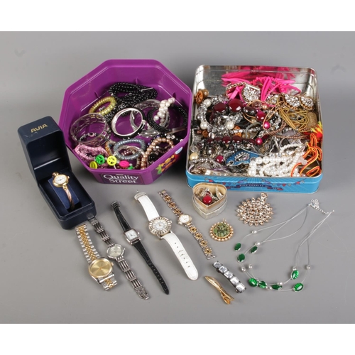 61 - Two boxes of costume jewellery and watches, containing various necklaces, bangles and bracelets, bro... 