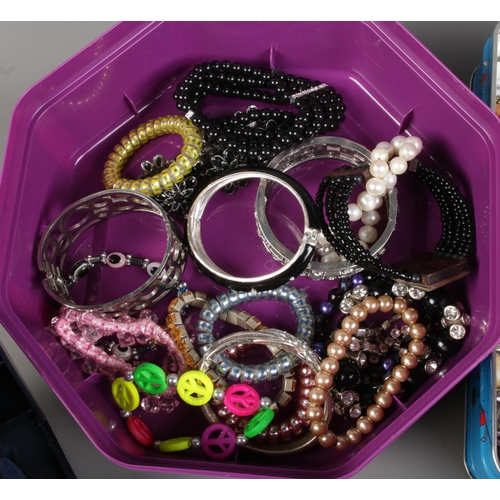 61 - Two boxes of costume jewellery and watches, containing various necklaces, bangles and bracelets, bro... 