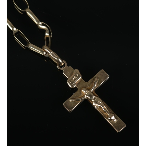 433 - A 9ct gold crucifix on on chain. Approx. chain length clasped 29cm. Total weight 4.65g.