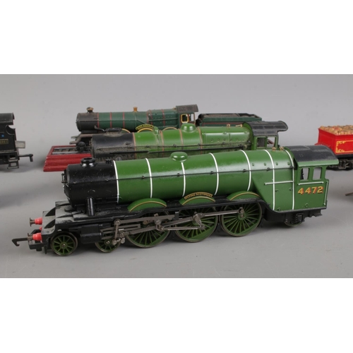 74 - A collection of seven model railway engines, to include Tri-ang R358 Old Timer 