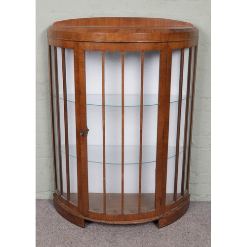 539 - A demi-lune mahogany glazed display cabinet featuring two glass shelves. Approx. dimensions 92cm x 3... 