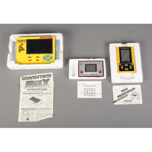 113 - A collection of retro handheld gaming consoles.  To include Nintendo Game & Watch Ball, Grandstand M... 