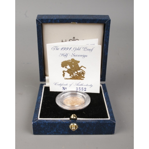 430 - The Royal Mint: An Elizabeth II half sovereign, dated 1991, in case with certificate No. 3552. 4.01g