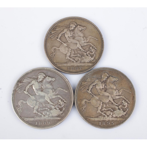 432 - Three Victorian silver crowns; 1887 (milled edge), 1889 (milled edge) and 1895 (LVIII edge). Total w... 