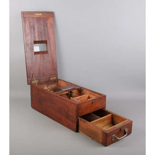 73 - A early Twentieth century mahogany cased cash till, with lift up top revealing mechanism and lower p... 