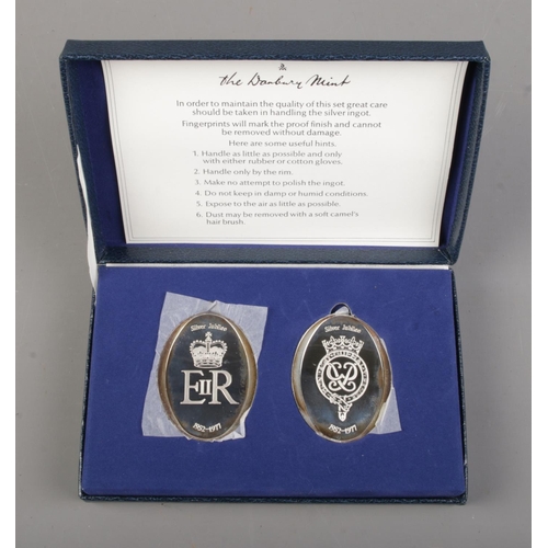 482 - The Danbury Mint: Two silver lozenge shaped ingots commemorating the Silver Jubilee of Queen Elizabe... 