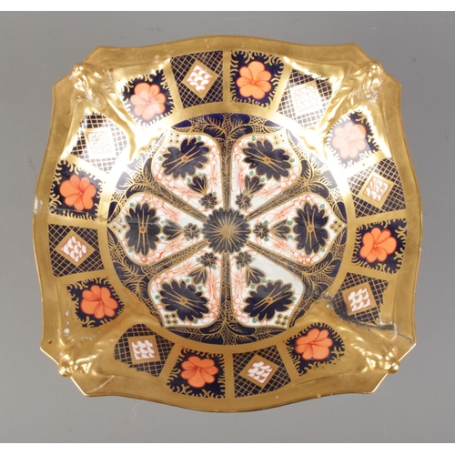 496 - A Royal Crown Derby centerpiece tazza, decorated in the 1128 Old Imari pattern on quatrefoil dolphin... 