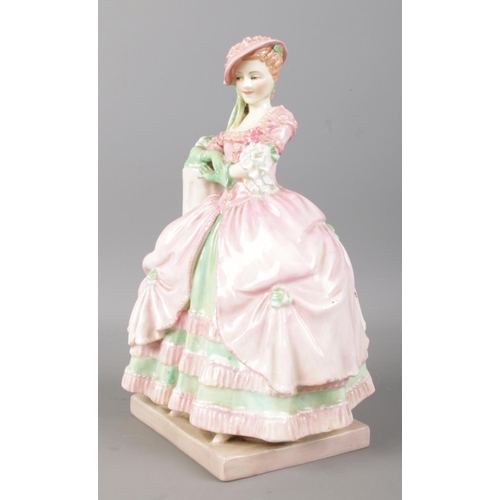 497 - An early Royal Doulton ceramic figurine 'Kate Hardcastle' HN 1718, produced between 1935 - 1949, des... 