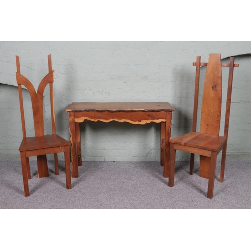 507 - Two unusual yew wood chairs, together with a yew wood live edge side table with lower drawer. Dimens... 