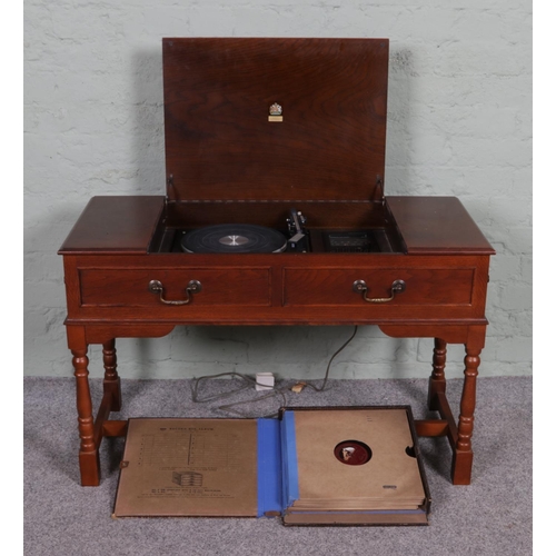 508 - A mahogany cased Dynatron RG 1210 PK radiogram, fitted with Garrard SP25 Mk IV turntable and a colle... 