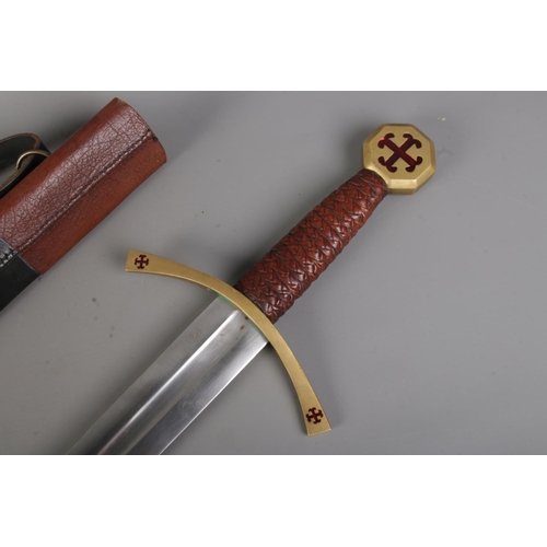 56 - A modern reproduction Knights Templar sword with sheath. CANNOT POST