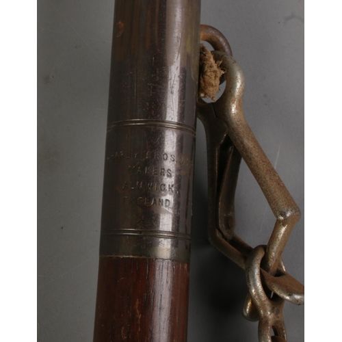 487 - Hardy Bros Ltd, a combined gaff and wading stick, having a steel hook with hook protector leading to... 